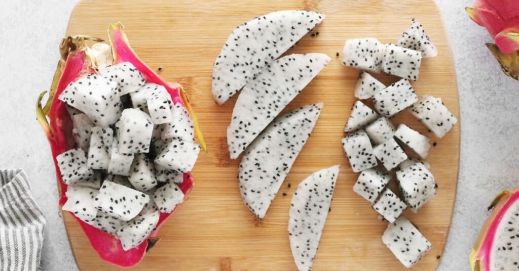 Cut the dragon fruit into cubes and slices